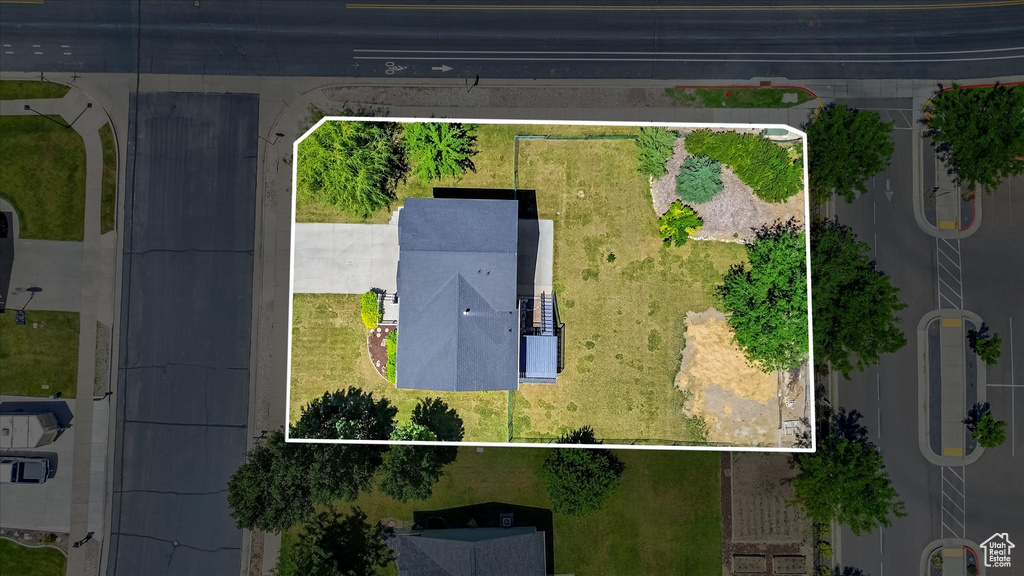 Aerial overview of property\'s location featuring property parcel outlined