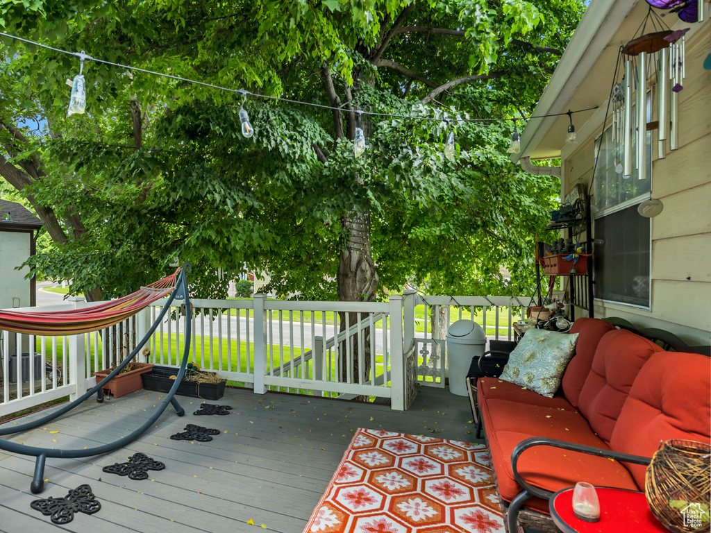 Deck with an outdoor living space