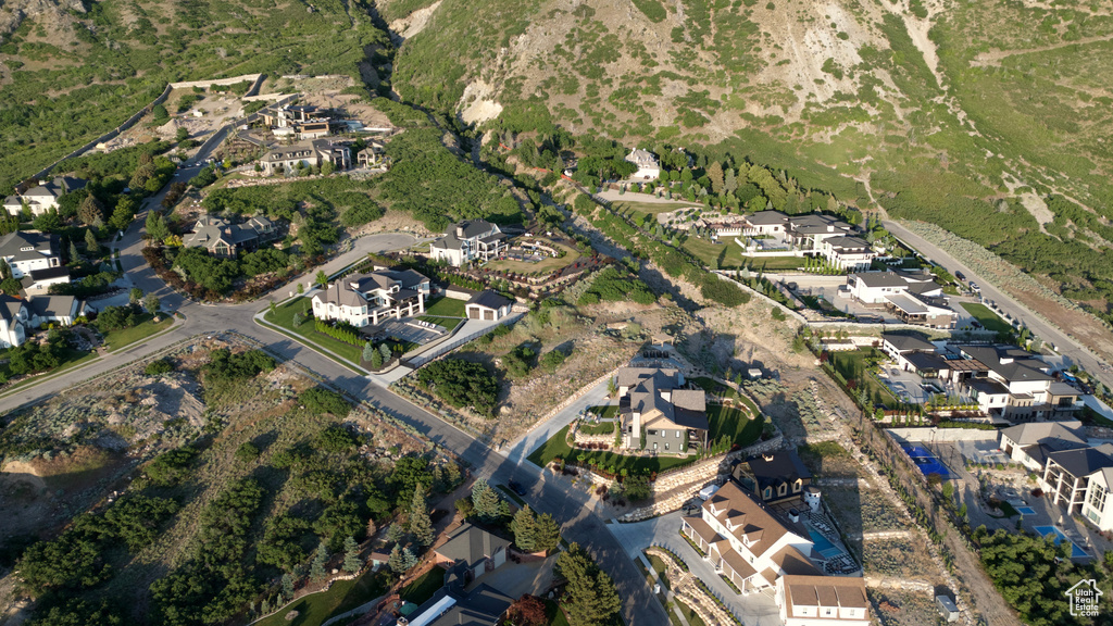 Aerial view of property's location featuring nearby suburban area
