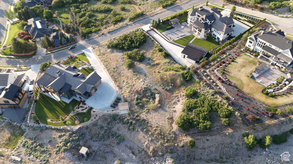 Aerial overview of property's location featuring nearby suburban area