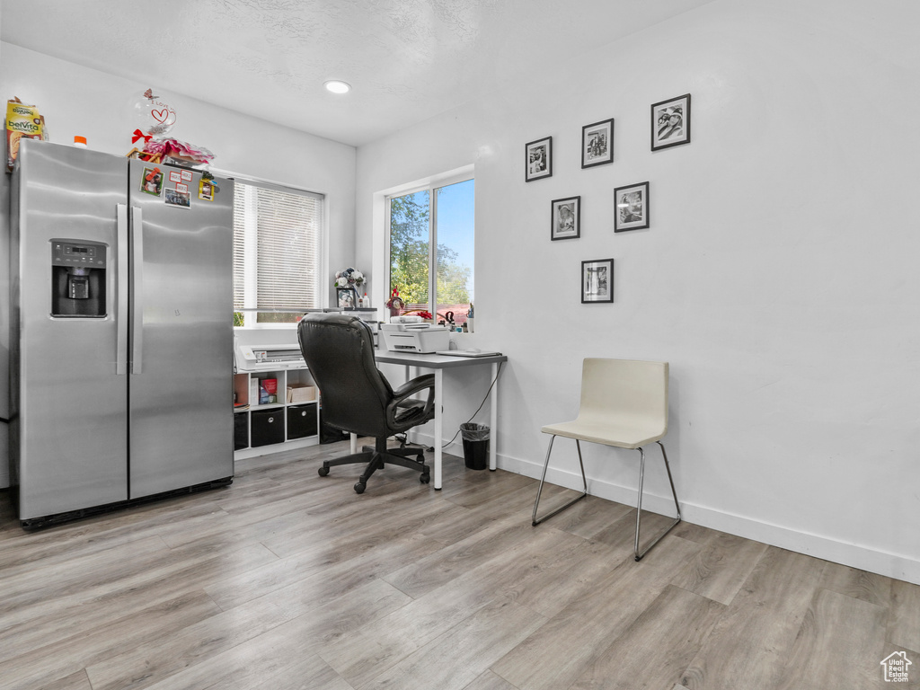 Office area featuring wood finished floors, baseboards, and recessed lighting