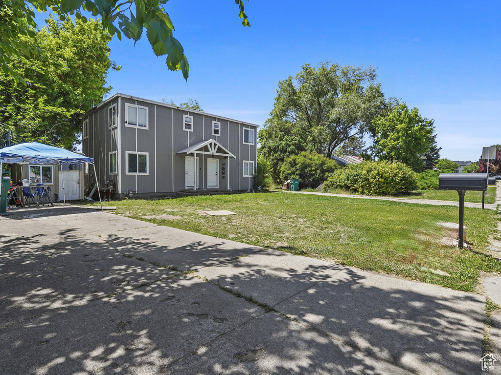 View of front of home with a front lawn
