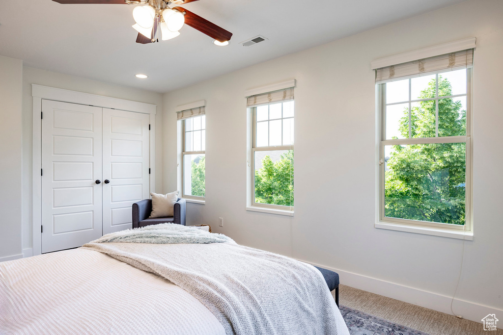 Bedroom featuring carpet, baseboards, a closet, a ceiling fan, and recessed lighting