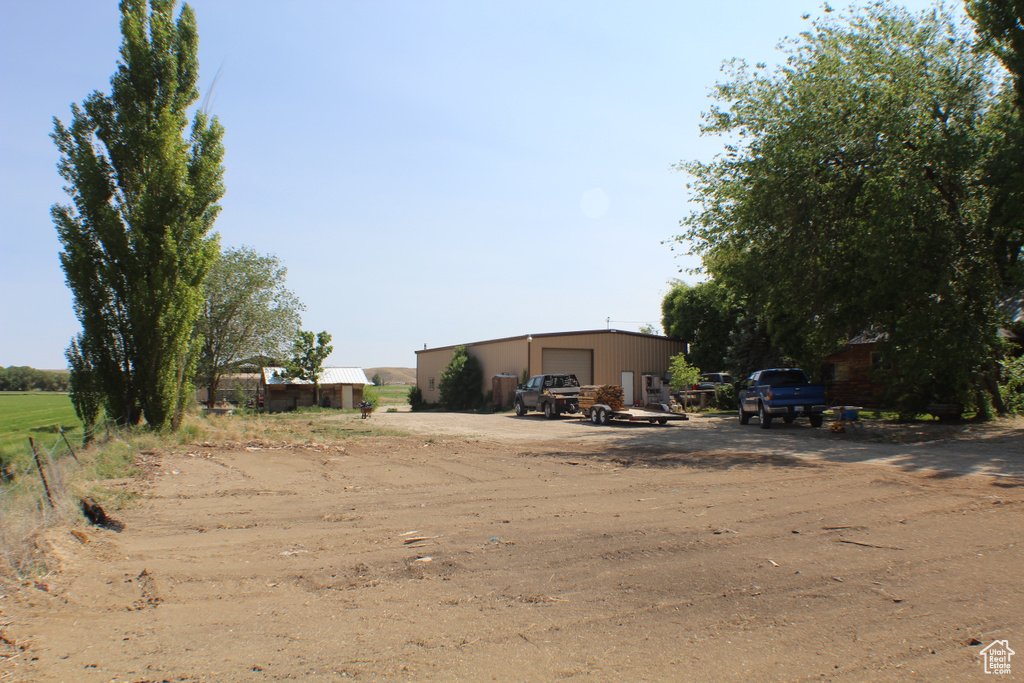 View of yard with a garage