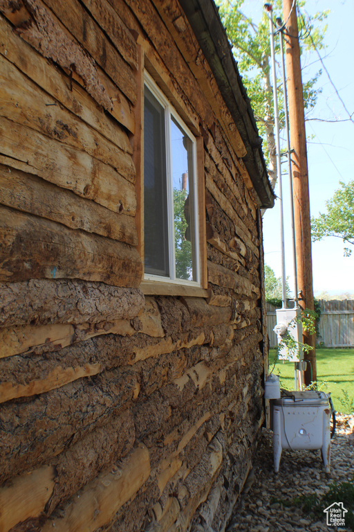 View of property exterior featuring stone siding