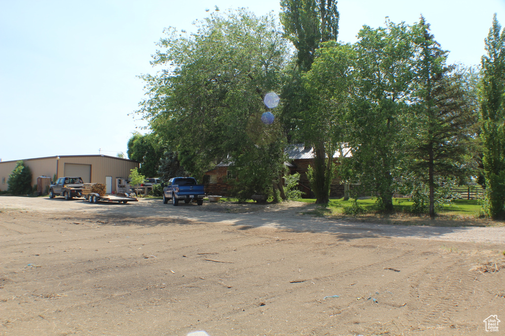 View of yard featuring a garage