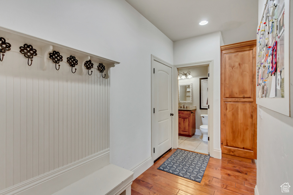 Mudroom featuring light wood-style flooring