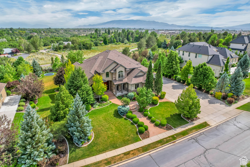 Aerial view of residential area with mountains