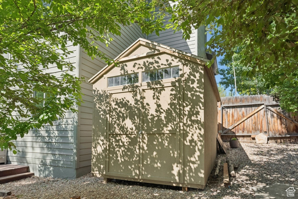 View of home's exterior with a gate
