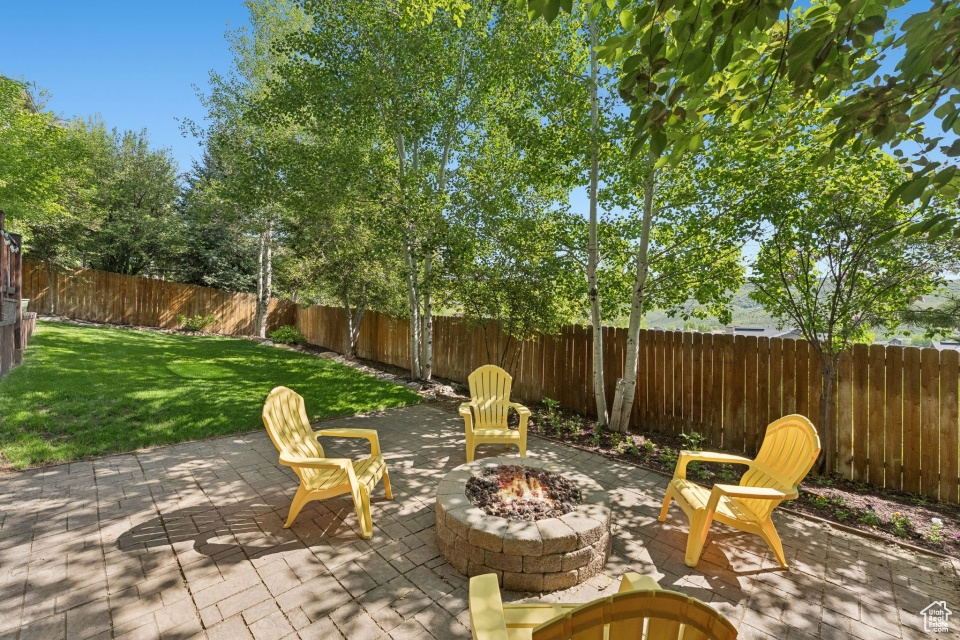 View of patio / terrace featuring a fire pit