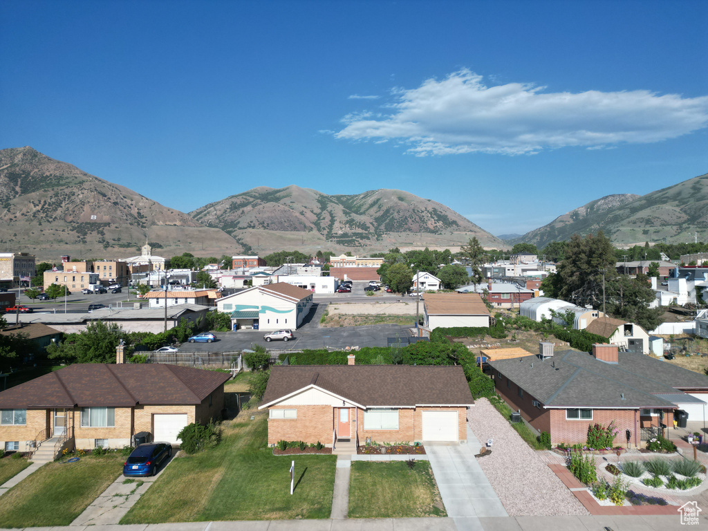 View of mountain background featuring nearby suburban area