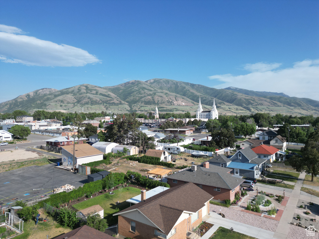 Mountain view featuring nearby suburban area