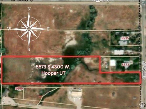 Aerial overview of property's location featuring property parcel outlined