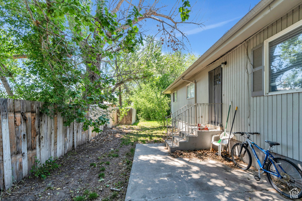 Fenced backyard featuring a patio area