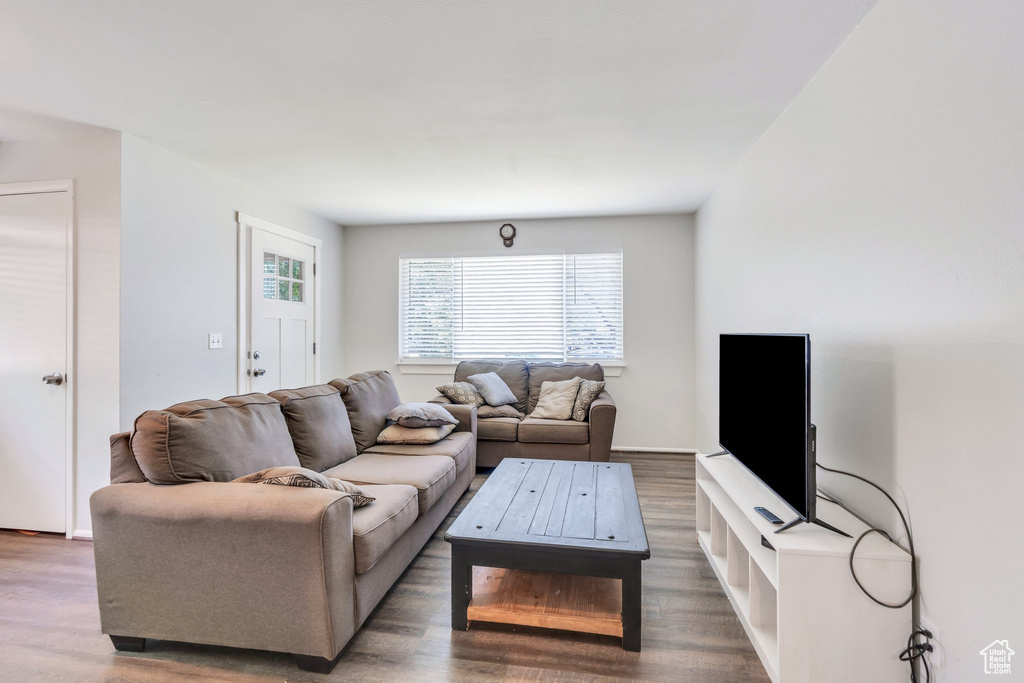 Living room featuring wood finished floors