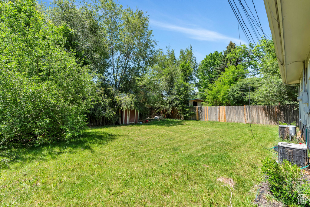 View of yard with central AC