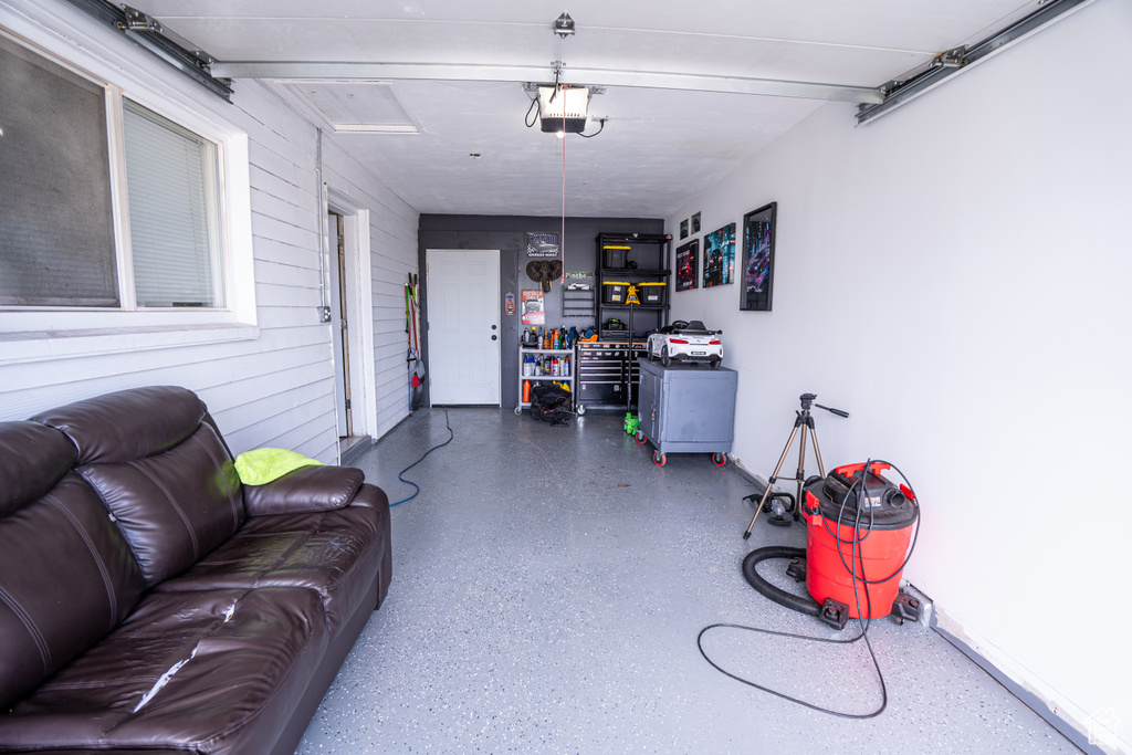 Garage featuring baseboards