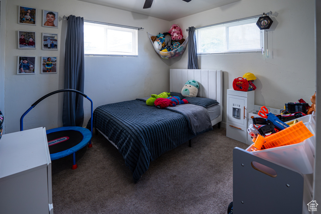 Bedroom with carpet flooring and ceiling fan