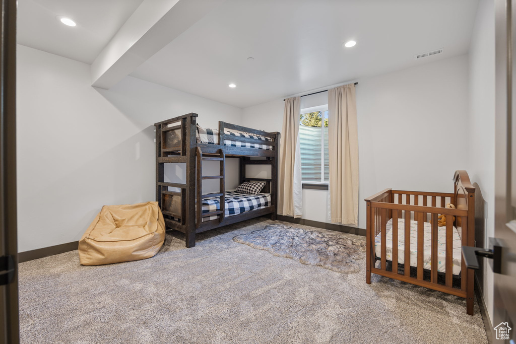 Bedroom featuring carpet floors, recessed lighting, and baseboards