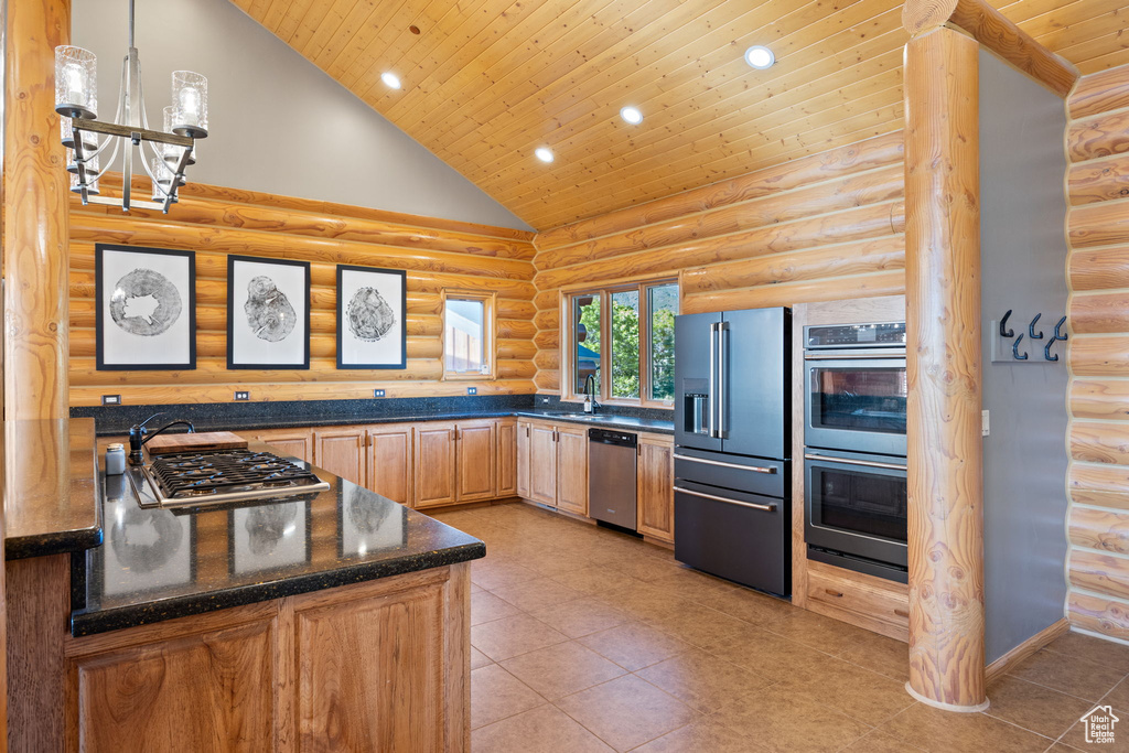 Kitchen featuring stainless steel appliances, log walls, high vaulted ceiling, wood ceiling, and recessed lighting