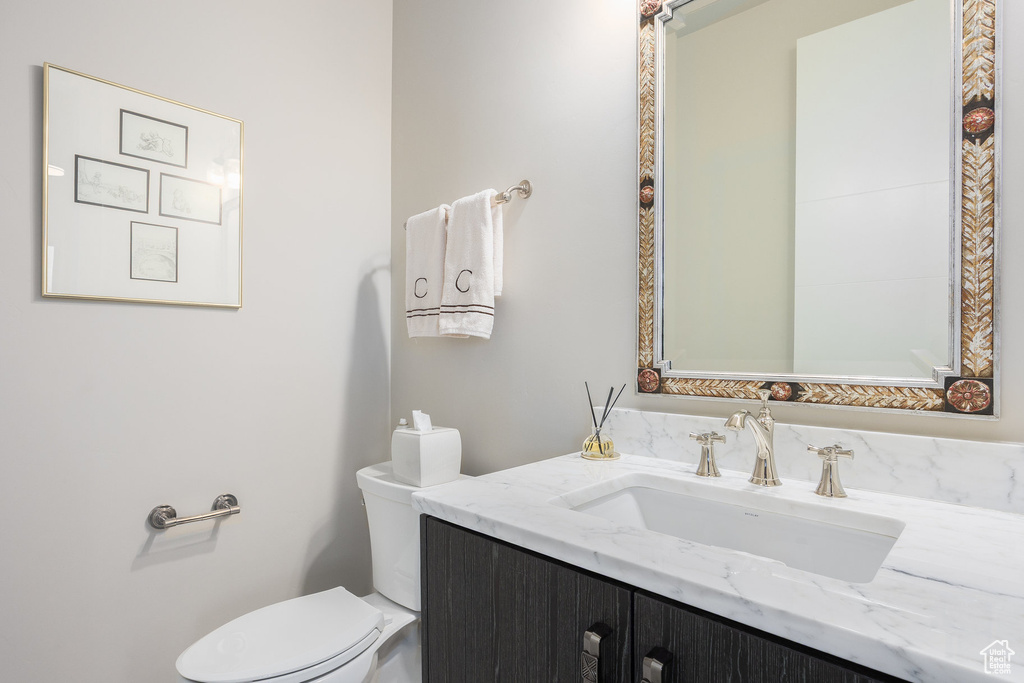 Bathroom featuring toilet and vanity