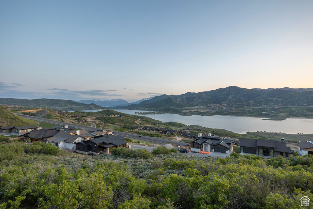 Mountain view featuring a nearby body of water