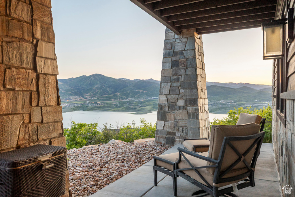 View of patio / terrace with a mountain view and central air condition unit