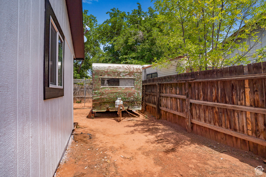 View of fenced backyard