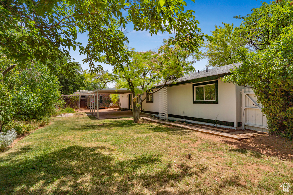 View of yard with a patio area