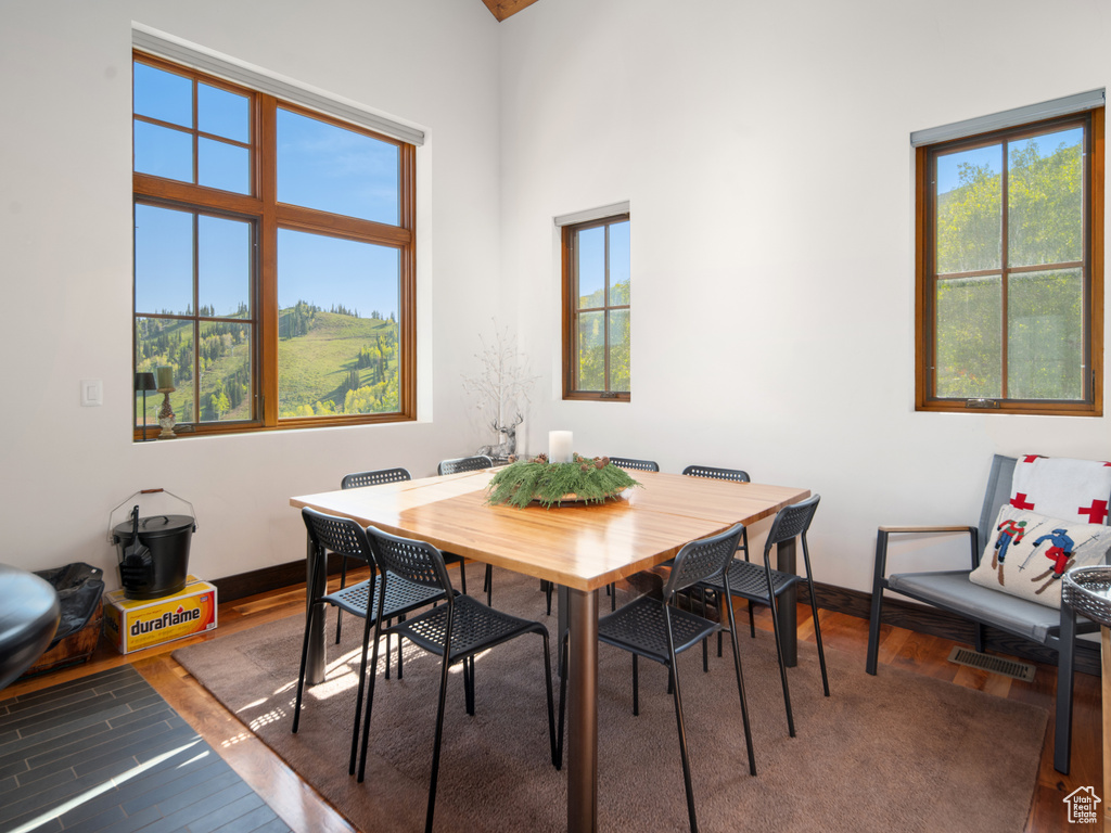 Dining room with baseboards and wood finished floors
