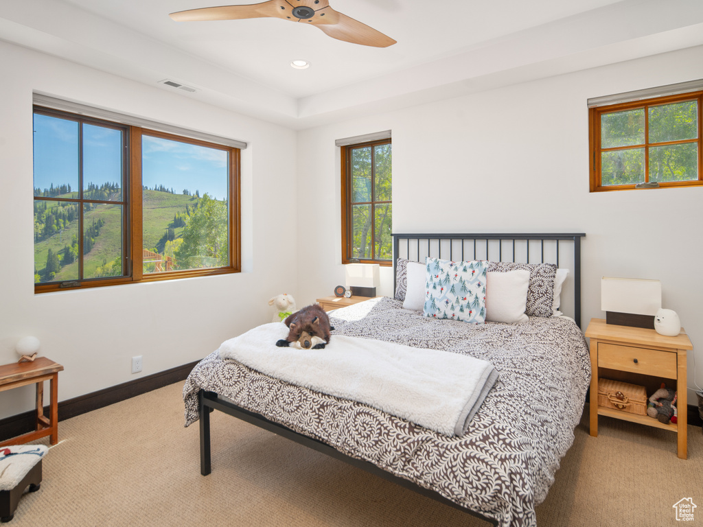 Bedroom featuring carpet flooring, baseboards, a ceiling fan, and recessed lighting