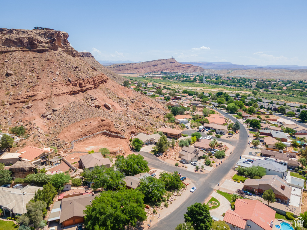Aerial view of residential area featuring a mountain backdrop