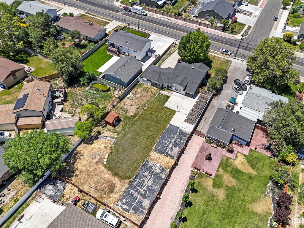 Aerial view of property\'s location with nearby suburban area