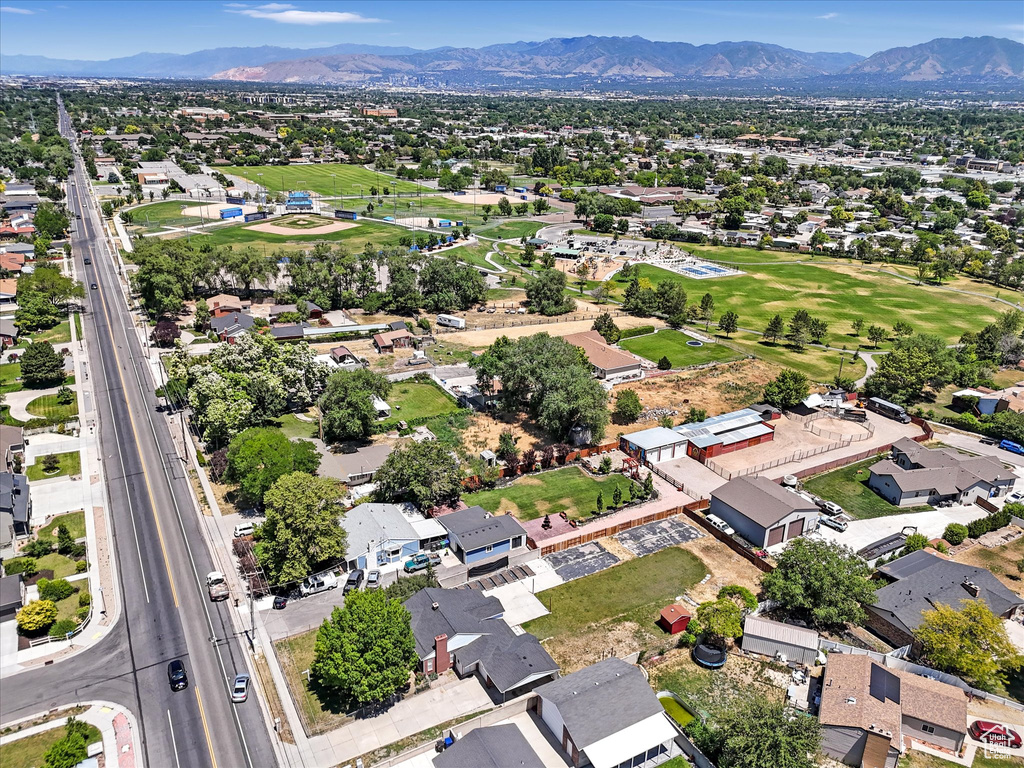 Aerial view of residential area featuring a mountain backdrop