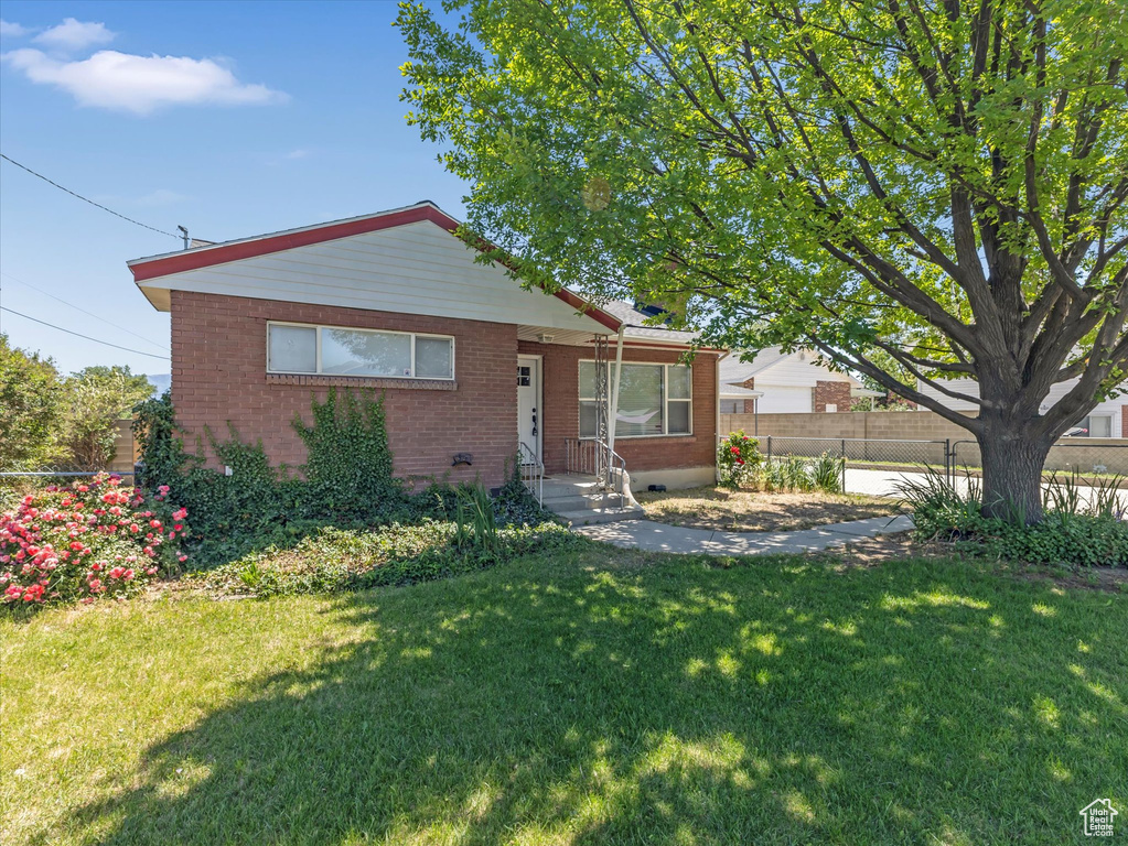 View of front of property featuring brick siding