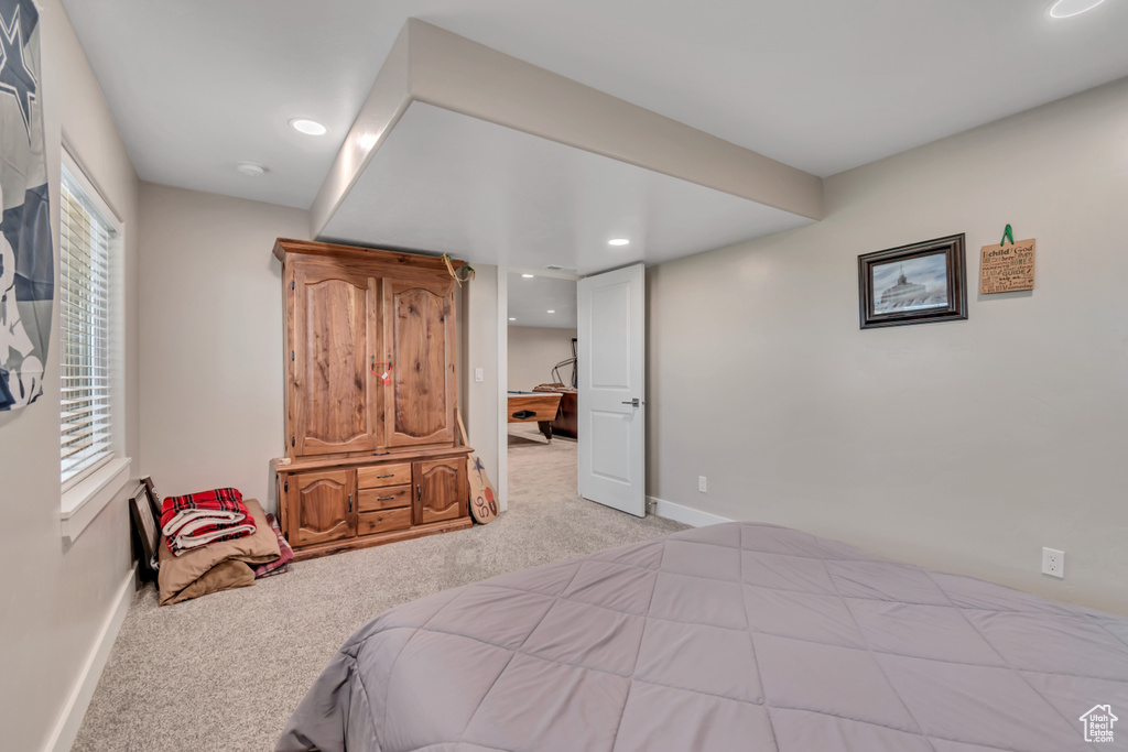 Bedroom with carpet, baseboards, and recessed lighting