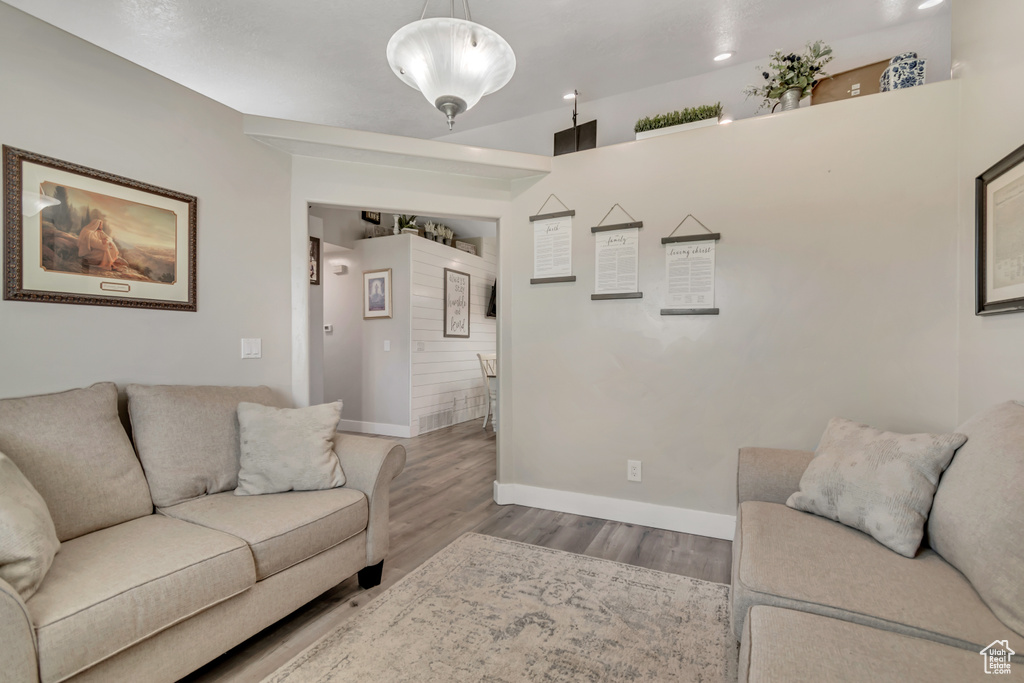 Living room featuring baseboards and wood finished floors
