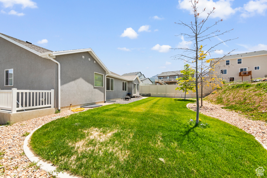 View of yard with a residential view and a patio area