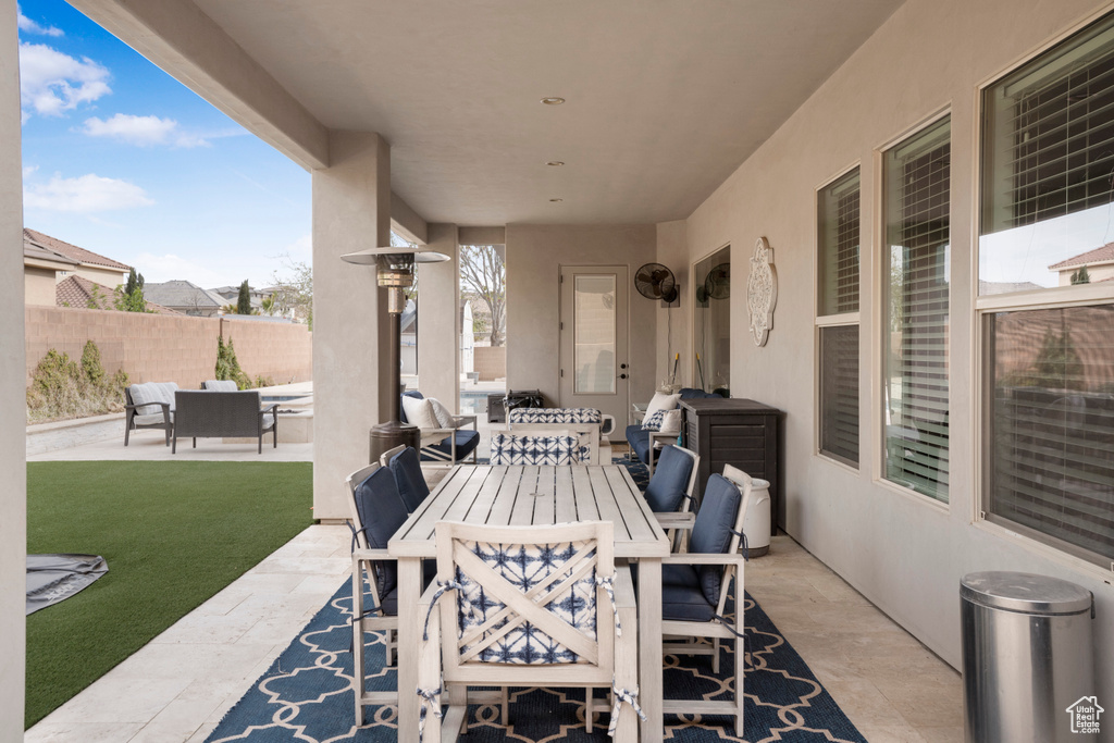 View of patio / terrace featuring outdoor dining area and an outdoor living space