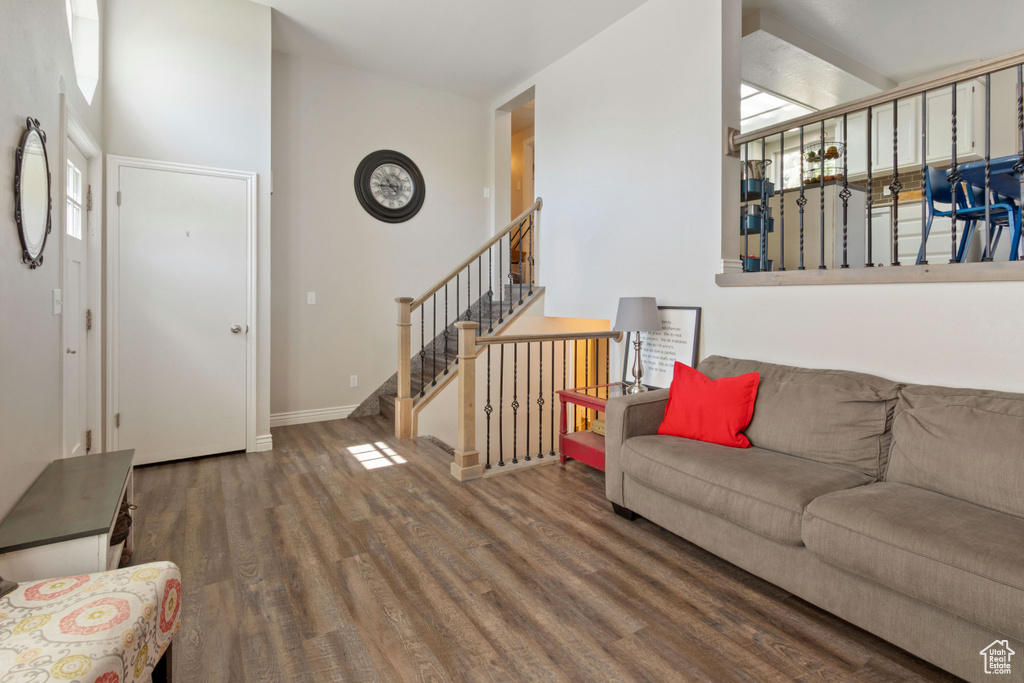 Living room with wood finished floors and baseboards