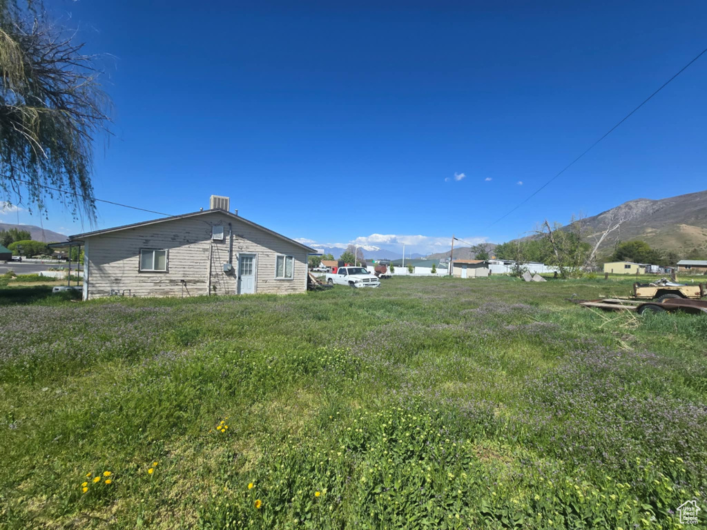 View of yard with a mountain view