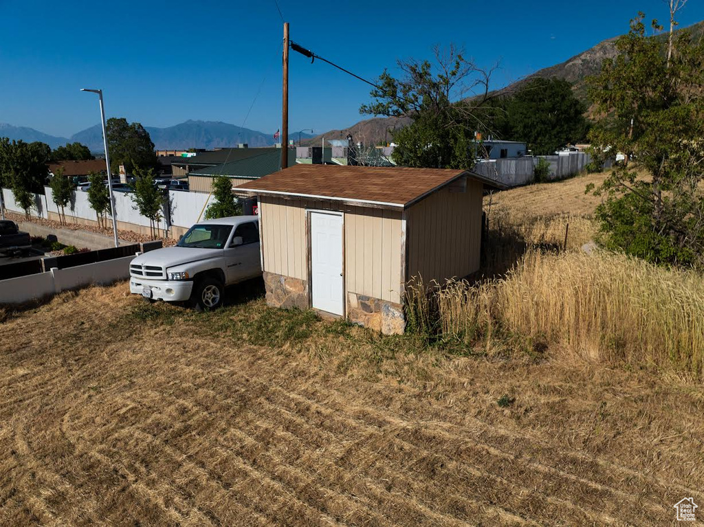 View of shed featuring a mountain view