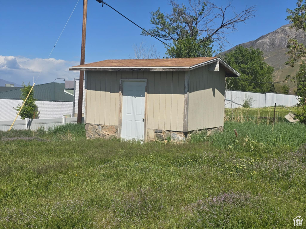 View of shed with a mountain view
