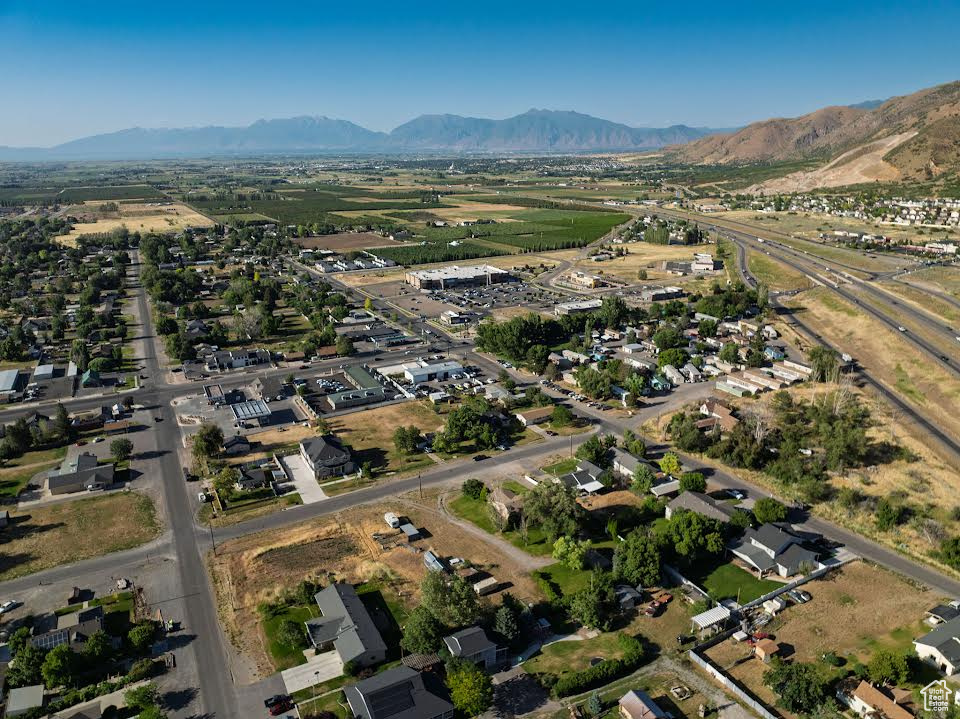 Aerial overview of property's location with a mountain backdrop