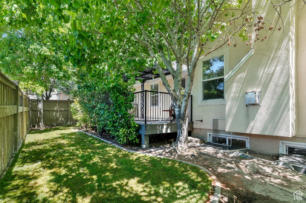 View of yard featuring a deck