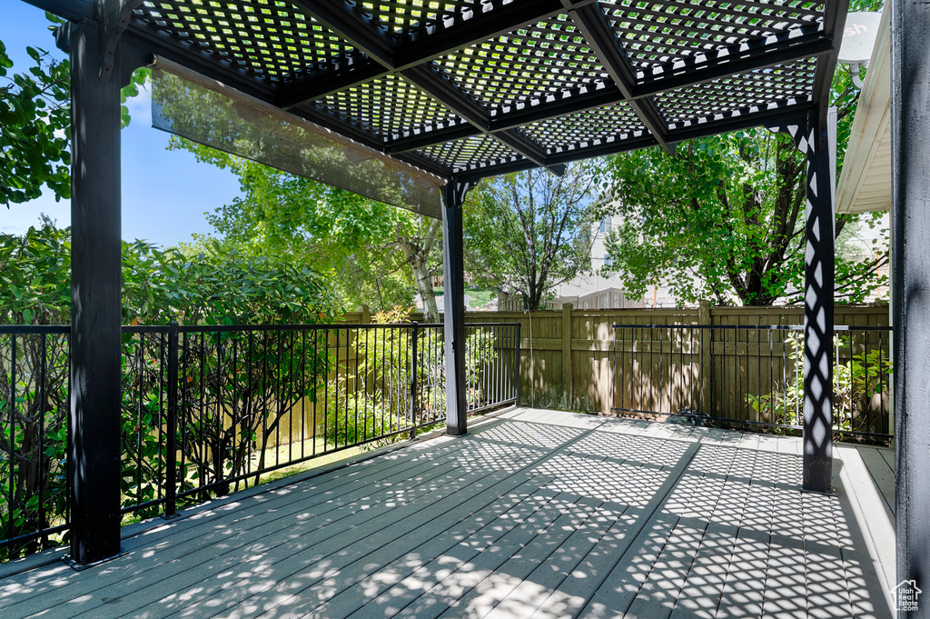 Wooden terrace with a pergola