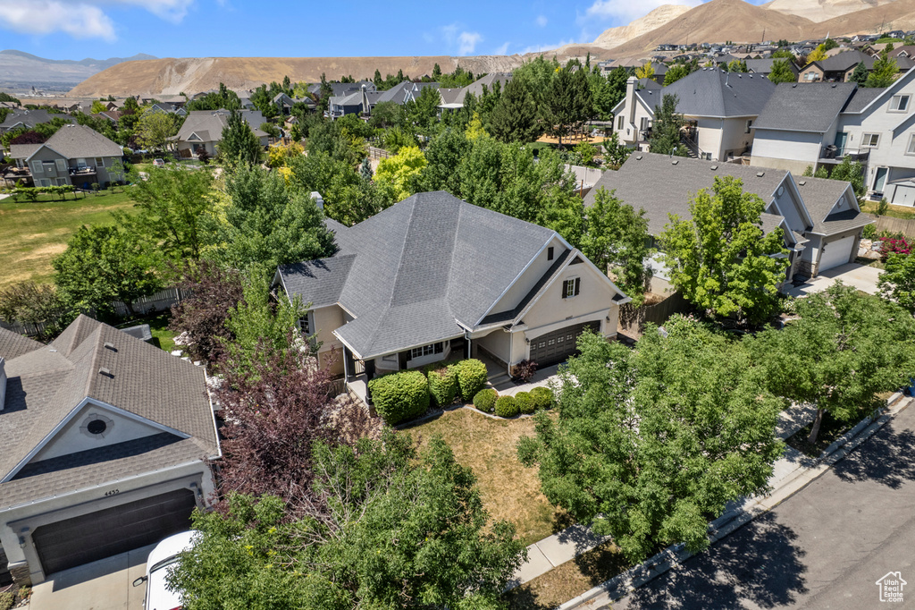 Aerial perspective of suburban area featuring mountains