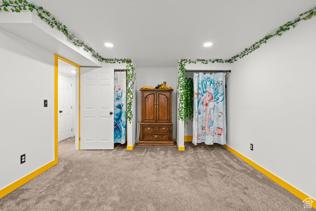 Bedroom with recessed lighting, carpet, and baseboards