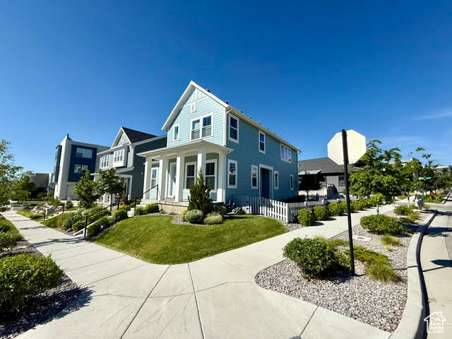 View of front of home featuring covered porch