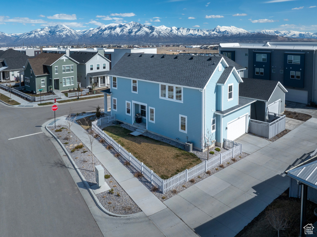 Aerial perspective of suburban area featuring mountains